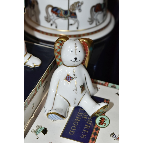 426 - A GROUP OF BOXED ROYAL CROWN DERBY PAPERWEIGHTS AND MONEY BOX, comprising a 'Treasures of Childhood ... 