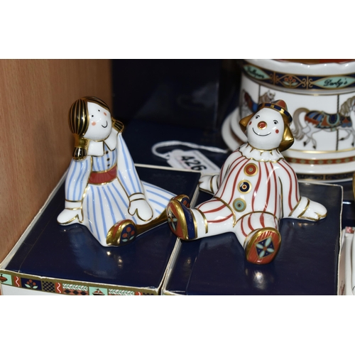 426 - A GROUP OF BOXED ROYAL CROWN DERBY PAPERWEIGHTS AND MONEY BOX, comprising a 'Treasures of Childhood ... 