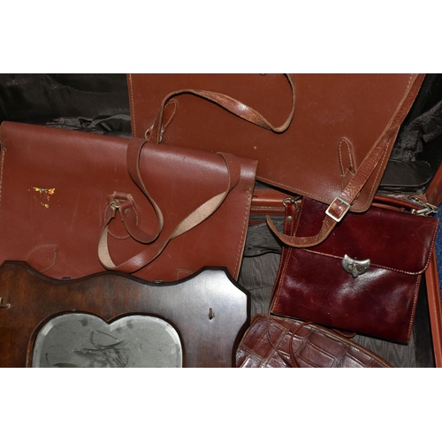 432 - A BROWN TRAVELLING TRUNK, containing two brown leather school satchels (one monogrammed), a brown cr... 