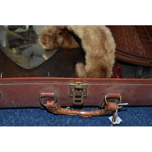 432 - A BROWN TRAVELLING TRUNK, containing two brown leather school satchels (one monogrammed), a brown cr... 