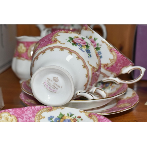 436 - A ROYAL ALBERT 'LADY CARLYLE' PATTERN TEA SET FOR TWO, comprising a small teapot, milk jug, sugar bo... 