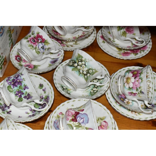 439 - A GROUP OF ROYAL ALBERT 'FLOWER OF THE MONTH SERIES' TEAWARE, comprising a 'Forget Me Not' pattern t... 