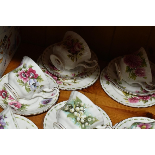 439 - A GROUP OF ROYAL ALBERT 'FLOWER OF THE MONTH SERIES' TEAWARE, comprising a 'Forget Me Not' pattern t... 