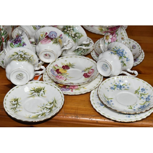 439 - A GROUP OF ROYAL ALBERT 'FLOWER OF THE MONTH SERIES' TEAWARE, comprising a 'Forget Me Not' pattern t... 