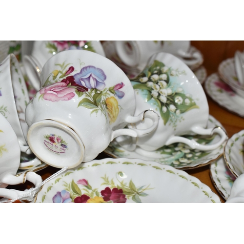 439 - A GROUP OF ROYAL ALBERT 'FLOWER OF THE MONTH SERIES' TEAWARE, comprising a 'Forget Me Not' pattern t... 