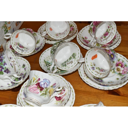 439 - A GROUP OF ROYAL ALBERT 'FLOWER OF THE MONTH SERIES' TEAWARE, comprising a 'Forget Me Not' pattern t... 