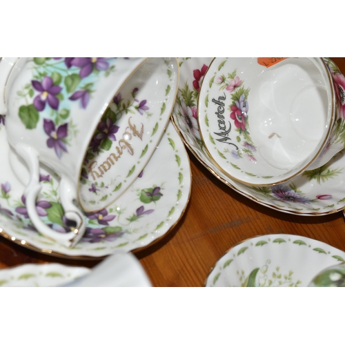 439 - A GROUP OF ROYAL ALBERT 'FLOWER OF THE MONTH SERIES' TEAWARE, comprising a 'Forget Me Not' pattern t... 