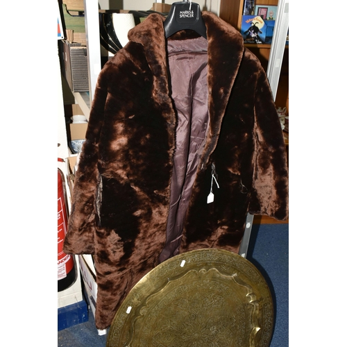 443 - TWO BOXES OF BOOKS AND SUNDRIES, to include a vintage brown faux fur coat, large brass circular tabl... 