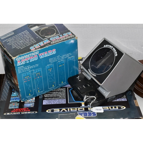 469 - SEGA MEGADRIVE GAMES AND GRANDSTAND ASTRO WARS BOXED, MegaDrive games include The Terminator, Sonic ... 