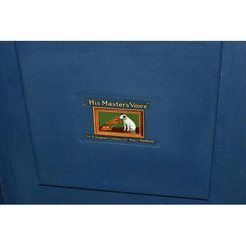 502 - A 1930s HMV MODEL 102 WIND UP GRAMOPHONE IN BLUE PORTABLE CASE, including twelve LPs featuring artis... 