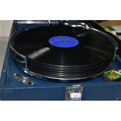 502 - A 1930s HMV MODEL 102 WIND UP GRAMOPHONE IN BLUE PORTABLE CASE, including twelve LPs featuring artis... 