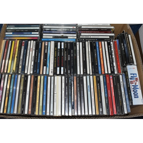 507 - FOUR BOXES OF BOOKS, CDS, and LPs, the sixty five books to include a variety of cookbooks, classics,... 