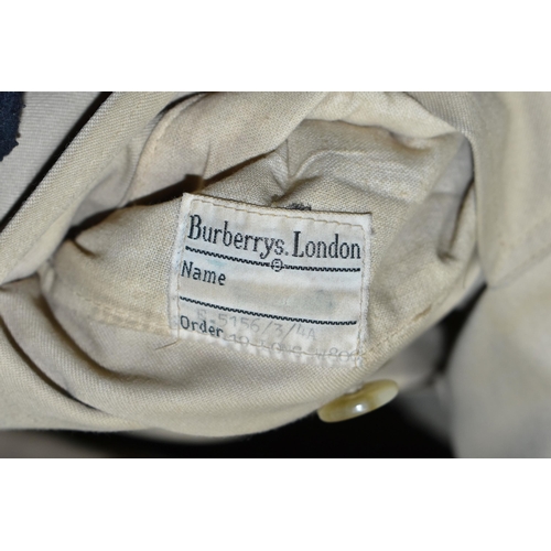 530 - ELEVEN ITEMS OF LADIES' 'MADELEINE' CLOTHING AND A BELTED BURBERRY TRENCH COAT, to include twelve it... 