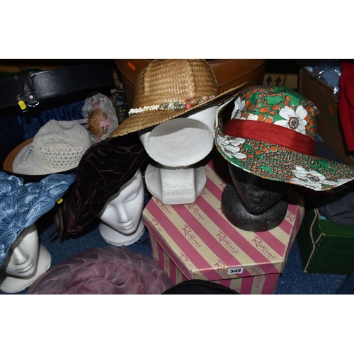 549 - A GROUP OF HATS AND HAT BOXES, to include approximately fifteen to twenty vintage and modern hats, o... 