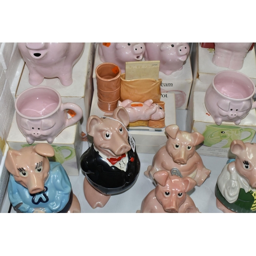 553 - A COLLECTION OF PIG THEMED CERAMICS, to include five Wade Nat West piggy banks: Sir Nathaniel (toe c... 