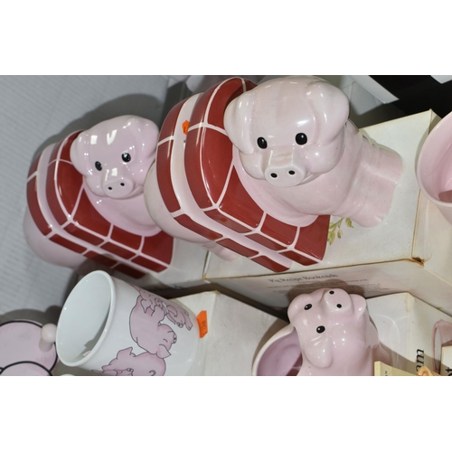 553 - A COLLECTION OF PIG THEMED CERAMICS, to include five Wade Nat West piggy banks: Sir Nathaniel (toe c... 