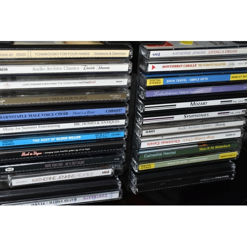 566 - EIGHT CASES OF VARYING SIZE CONTAINING A LARGE COLLECTION OF LPS, CDS, CASETTE TAPES, including clas... 