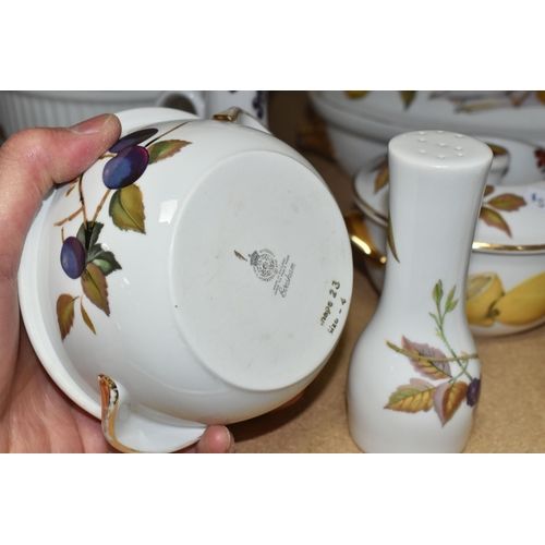 568 - THIRTY THREE PIECES OF ROYAL WORCESTER EVESHAM DINING WARE, including serving dishes, plates, tea po... 