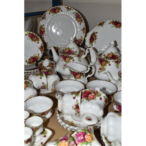 569 - A NINETY SIX PIECE ROYAL ALBERT 'OLD COUNTRY ROSES' DINNER SERVICE, comprising three large teapots (... 