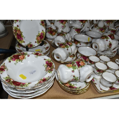 569 - A NINETY SIX PIECE ROYAL ALBERT 'OLD COUNTRY ROSES' DINNER SERVICE, comprising three large teapots (... 