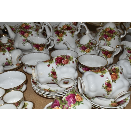 569 - A NINETY SIX PIECE ROYAL ALBERT 'OLD COUNTRY ROSES' DINNER SERVICE, comprising three large teapots (... 