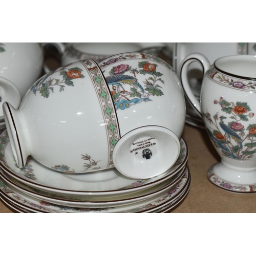 574 - A THIRTY SEVEN PIECE WEDGWOOD 'KUTANI CRANE' R4464 TEA AND COFFEE SET, comprising a teapot, a milk j... 