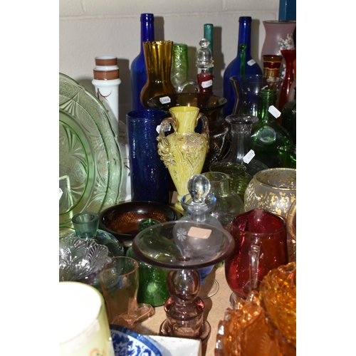 581 - A LARGE QUANTITY OF COLOURED AND STUDIO GLASS, comprising a Mary Gregory blue glass beaker, mid- cen... 