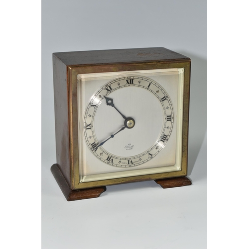 588 - A SMALL ELLIOTT MANTEL CLOCK, the case square in form, raised on two tapering feet, the dial marked ... 