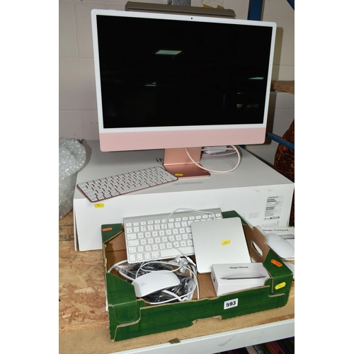 593 - A REFURBISHED 24 INCH APPLE iMAC COMPUTER WITH BOX, model number A2438, together with an Apple A3179... 