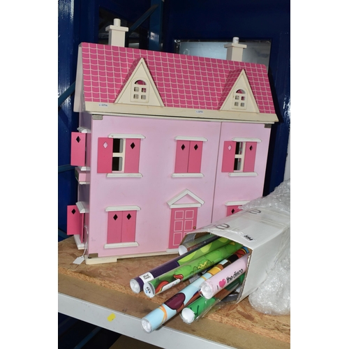 594 - A MODERN WOODEN DOLLS HOUSE, pink with white trim, front opening to reveal two rooms over two floors... 