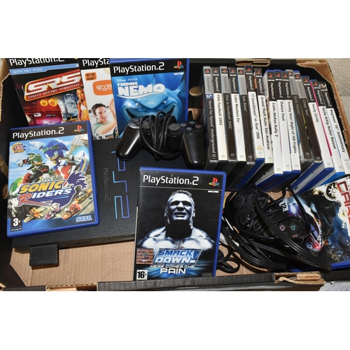 596 - PLAYSTATION 2 CONSOLE AND GAMES, console is in working condition (see photo, television not included... 