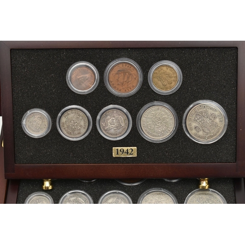 154 - A SMALL WOODEN COIN CABINET, consisting of eight drawers seven containing UK coinage from 1939-1945,... 