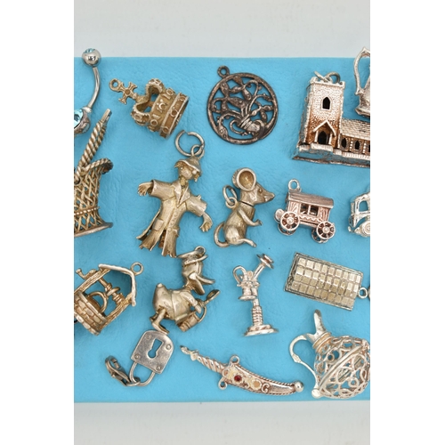 155 - ASSORTED SILVER AND WHITE METAL CHARMS, to include a silver ingot, hallmarked Birmingham, approximat... 