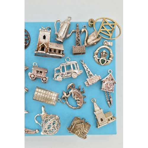 155 - ASSORTED SILVER AND WHITE METAL CHARMS, to include a silver ingot, hallmarked Birmingham, approximat... 