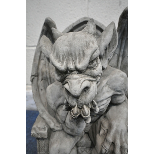 1198 - A MODERN COMPOSITE GROTESQUE, seated on a throne width 30cm x depth 20cm x height 48cm (condition- g... 