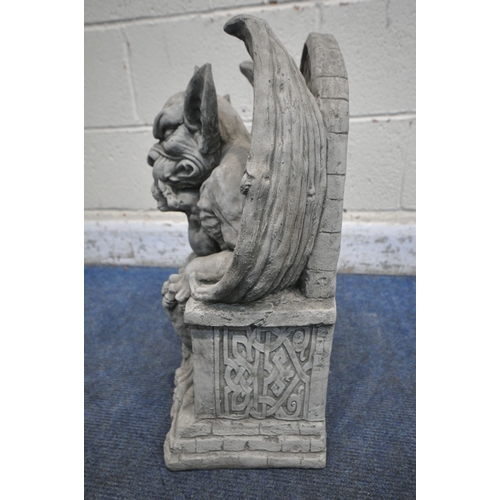 1198 - A MODERN COMPOSITE GROTESQUE, seated on a throne width 30cm x depth 20cm x height 48cm (condition- g... 