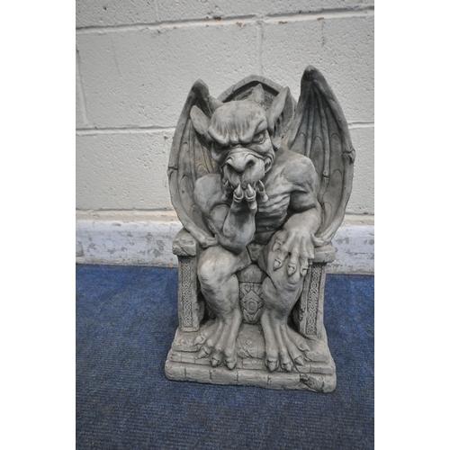 1198 - A MODERN COMPOSITE GROTESQUE, seated on a throne width 30cm x depth 20cm x height 48cm (condition- g... 