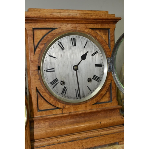 325 - A WOODEN CASED BRACKET CLOCK AND MANTEL CLOCK, the bracket clock with fretwork panels, the silvered ... 