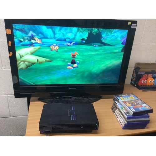 596 - PLAYSTATION 2 CONSOLE AND GAMES, console is in working condition (see photo, television not included... 