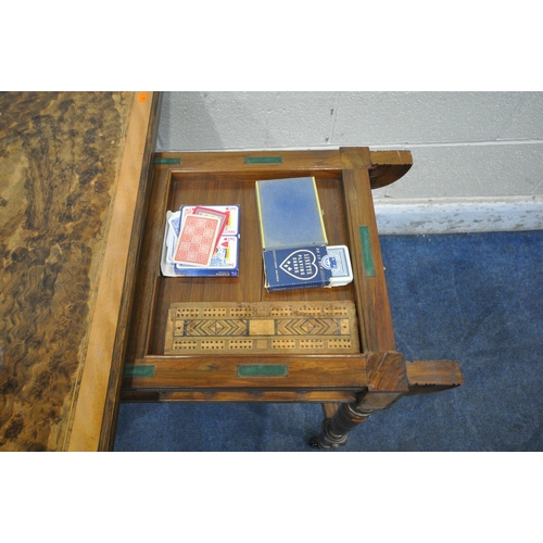 1203 - AN EDWARDIAN BURR WALNUT FOLD OVER CARD TABLE, the swivel top enclosing a green baize playing field ... 