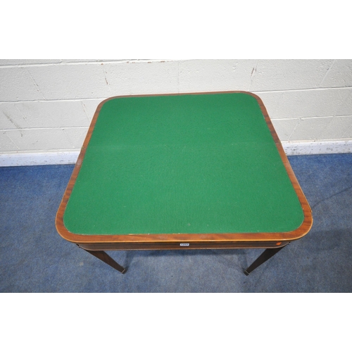 1204 - A GEORGIAN MAHOGANY FOLD OVER CARD TABLE, the top enclosing a green baize playing field, raised on s... 