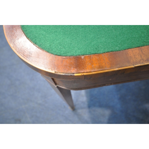 1204 - A GEORGIAN MAHOGANY FOLD OVER CARD TABLE, the top enclosing a green baize playing field, raised on s... 