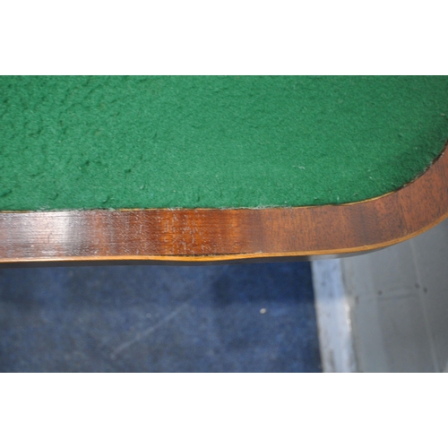 1204 - A GEORGIAN MAHOGANY FOLD OVER CARD TABLE, the top enclosing a green baize playing field, raised on s... 