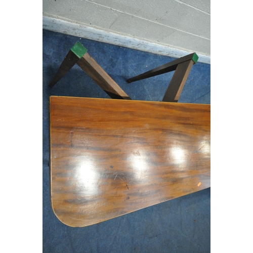 1204 - A GEORGIAN MAHOGANY FOLD OVER CARD TABLE, the top enclosing a green baize playing field, raised on s... 