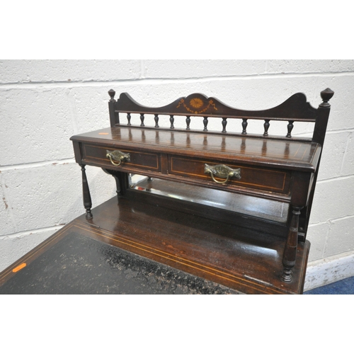 1205 - AN EDWARDIAN MAHOGANY DAVENPORT, with a raised back that's fitted with two drawers, above a hinged l... 