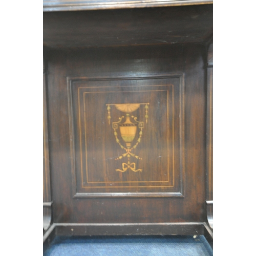 1205 - AN EDWARDIAN MAHOGANY DAVENPORT, with a raised back that's fitted with two drawers, above a hinged l... 