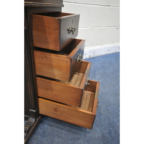 1205 - AN EDWARDIAN MAHOGANY DAVENPORT, with a raised back that's fitted with two drawers, above a hinged l... 