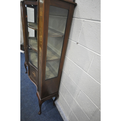 1210 - AN EDWARDIAN WALNUT AND INLAID SERPENTINE DISPLAY CABINET, the double glazed doors enclosing two she... 