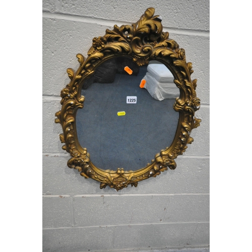 1225 - A GILT RESIN OVAL WALL MIRROR, with foliate design, 49cm x 65cm, a circular gilt resin convex wall m... 