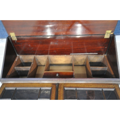 1227 - AN EARLY 20TH CENTURY MAHOGANY BUREAU BOOKCASE, the glazed door enclosing three shelves, atop a base... 